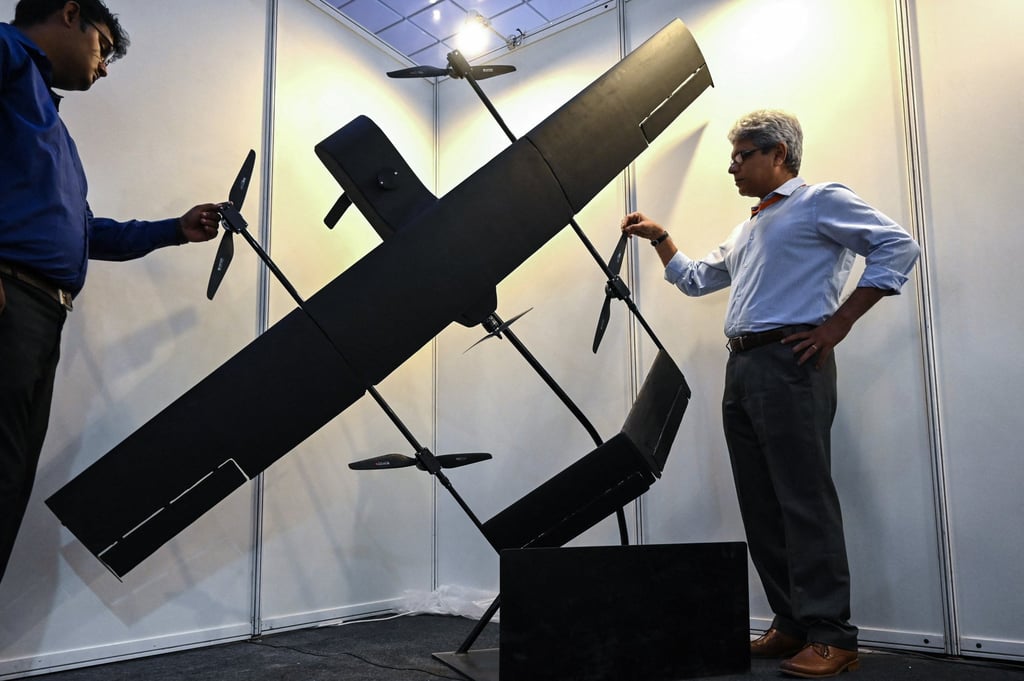 Visitors inspect a drone on display at a defence and technology exposition in Chennai, India, last year. Photo: AFP
