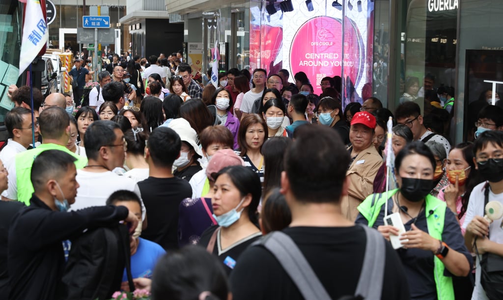Tour groups from mainland China are seen in Tsim Sha Tsui in Hong Kong on the first day of the golden week holiday on April 29, 2023. Photo: Yik Yeung-man