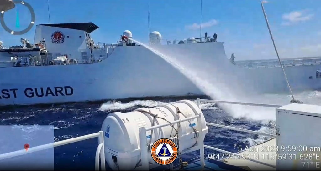The Philippine coastguard filmed the Chinese use of a water cannon against one of its ships. Photo: AP The Philippine coastguard filmed the Chinese use of a water cannon against one of its ships. Photo: AP