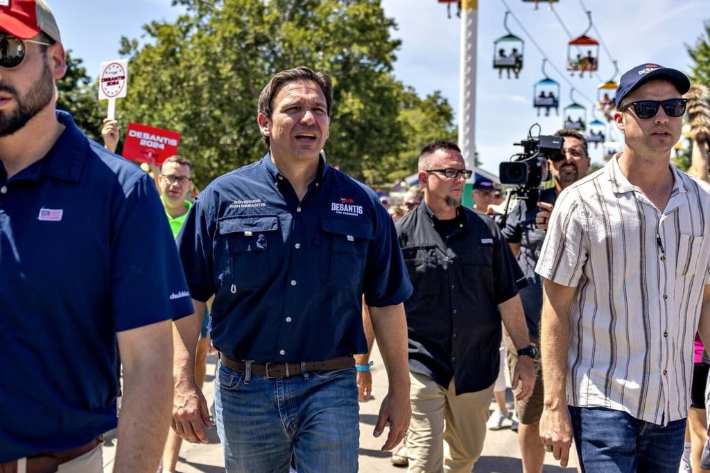 Ron DeSantis, governor of Florida, centre left, at the Iowa State Fair in Des Moines, Iowa on Saturday. Photo: Bloomberg Ron DeSantis, governor of Florida, centre left, at the Iowa State Fair in Des Moines, Iowa on Saturday. Photo: Bloomberg
