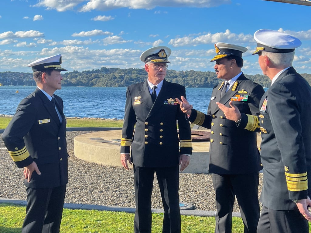 (From left) Vice-Admiral Saito Akira, commander in chief of Japan’s Self Defence Fleet, Rear Admiral Christopher Smith, commander of the Australian Fleet, Vice-Admiral Dinesh Tripathi, commanding-in-chief of India’s Western Naval Command, and Vice-Admiral Karl Thomas, commander of the US 7th Fleet, speak with each other in Sydney, Australia on August 10, as India, Japan, the US and Australia hold their first Malabar naval exercise off Australia. Photo: Reuters (From left) Vice-Admiral Saito Akira, commander in chief of Japan’s Self Defence Fleet, Rear Admiral Christopher Smith, commander of the Australian Fleet, Vice-Admiral Dinesh Tripathi, commanding-in-chief of India’s Western Naval Command, and Vice-Admiral Karl Thomas, commander of the US 7th Fleet, speak with each other in Sydney, Australia on August 10, as India, Japan, the US and Australia hold their first Malabar naval exercise off Australia. Photo: Reuters