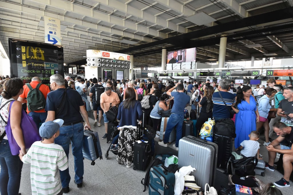 Travellers grounded after the closure of Catania airport in Sicily, Italy on Monday following the eruption of the Mount Etna volcano. Photo: EPA-EFE Travellers grounded after the closure of Catania airport in Sicily, Italy on Monday following the eruption of the Mount Etna volcano. Photo: EPA-EFE