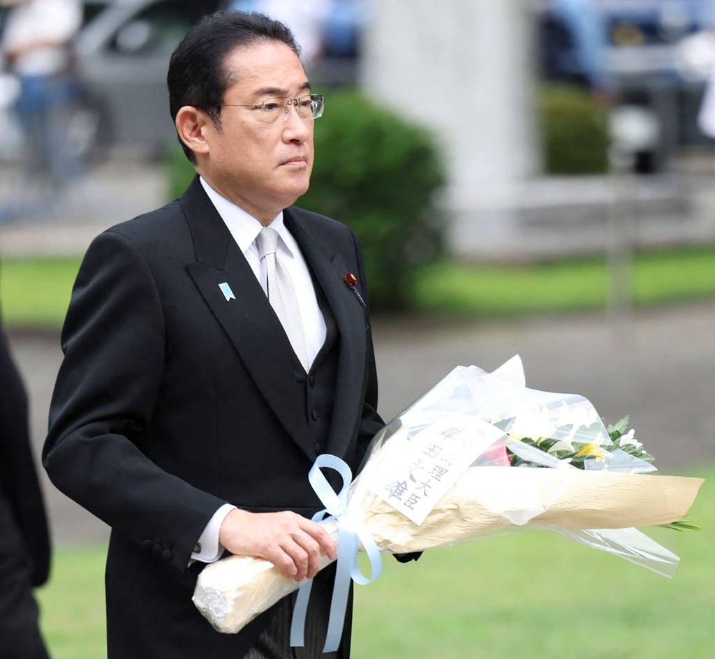 Japan’s Prime Minister Fumio Kishida offers flowers at the Chidorigafuchi National Cemetery for unidentified war dead of World War II in Tokyo on Tuesday. Photo: AFP
