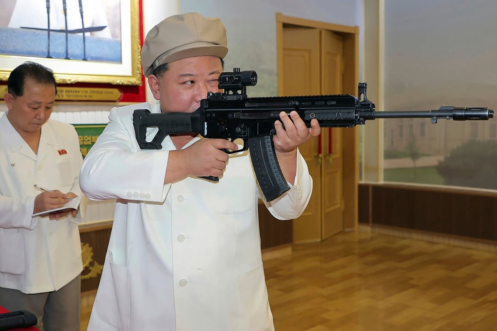 North Korean leader Kim Jong-un holds an assault rifle during an inspection of the country’s munitions factories earlier this month. Photo: Korean Central News Agency/Korea News Service via AP