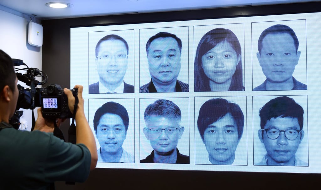 Nathan Law (bottom right) with the seven other activists now overseas who have HK$1 million prices on their heads. Photo: Dickson Lee Nathan Law (bottom right) with the seven other activists now overseas who have HK$1 million prices on their heads. Photo: Dickson Lee