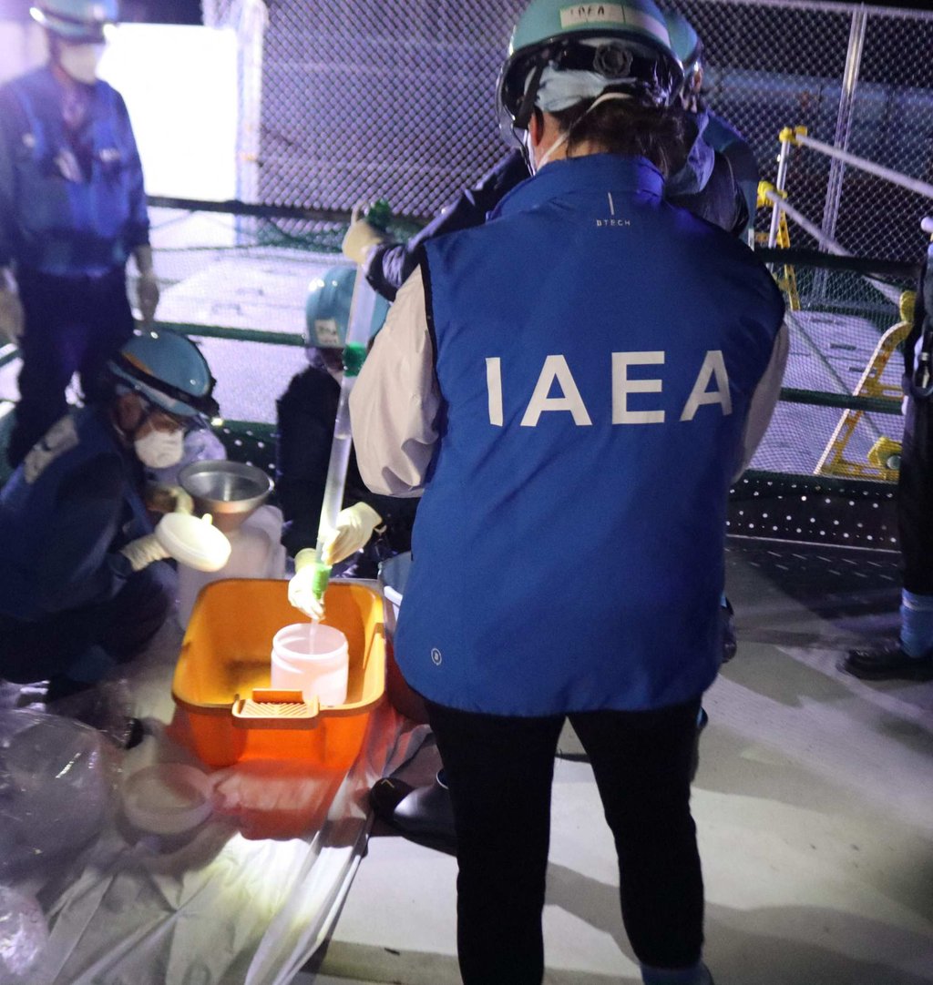A representative of the International Atomic Energy Agency (IAEA) witnesses sampling for the initial release of treated water at the Fukushima Daiichi nuclear power plant. Photo: Tepco Handout via AFP A representative of the International Atomic Energy Agency (IAEA) witnesses sampling for the initial release of treated water at the Fukushima Daiichi nuclear power plant. Photo: Tepco Handout via AFP
