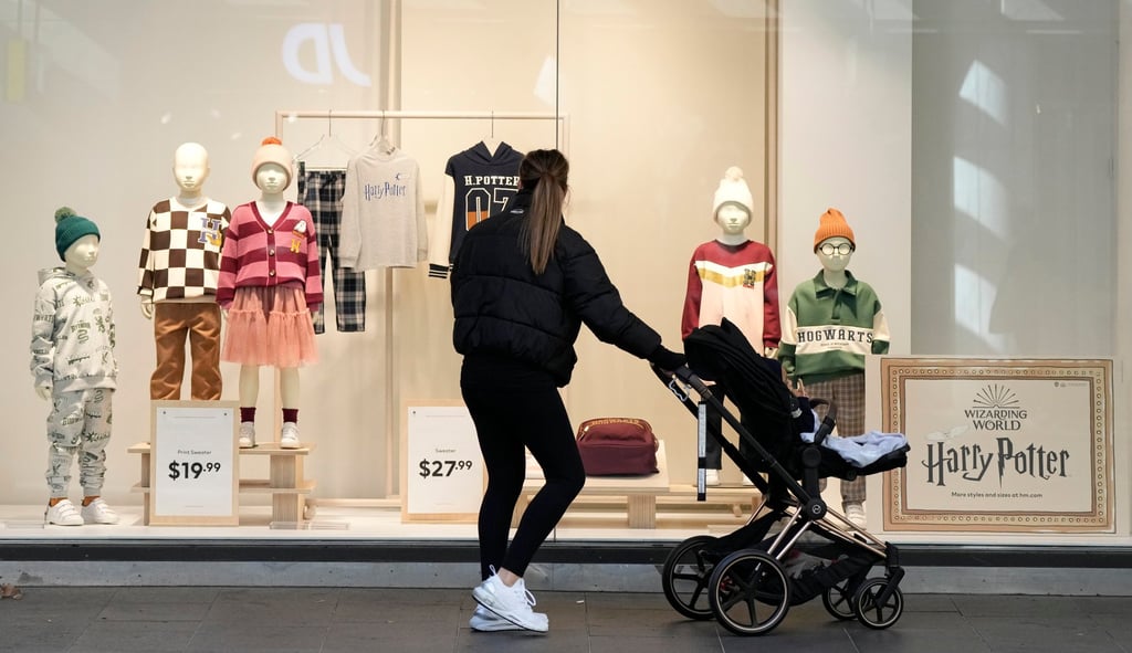 A woman pushes a pram in Sydney. Australia’s population growth will slow to 1.1 per cent annually in the next 40 years. Photo: AP A woman pushes a pram in Sydney. Australia’s population growth will slow to 1.1 per cent annually in the next 40 years. Photo: AP