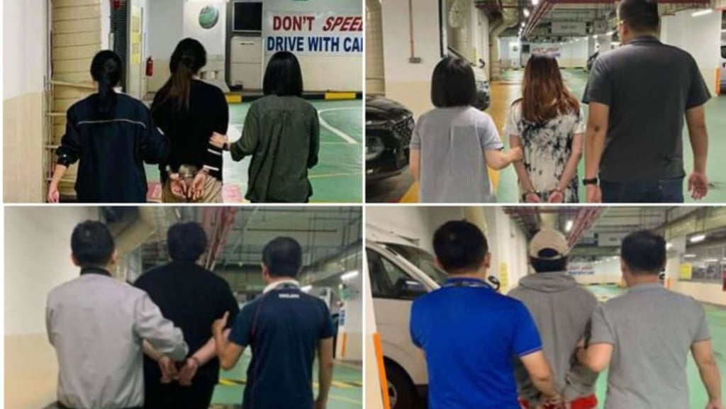 The suspects were arrested for their alleged involvement in banking-related malware scams targeting Android users. Photos: Singapore Police Force