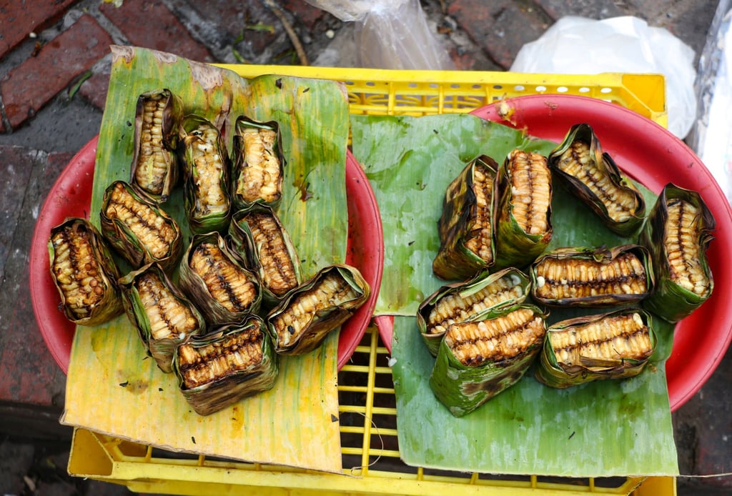 Hang peung – grilled honeycomb with bee larvae – at Luang Prabang’s morning market. Photo: Zinara Rathnayake Hang peung – grilled honeycomb with bee larvae – at Luang Prabang’s morning market. Photo: Zinara Rathnayake