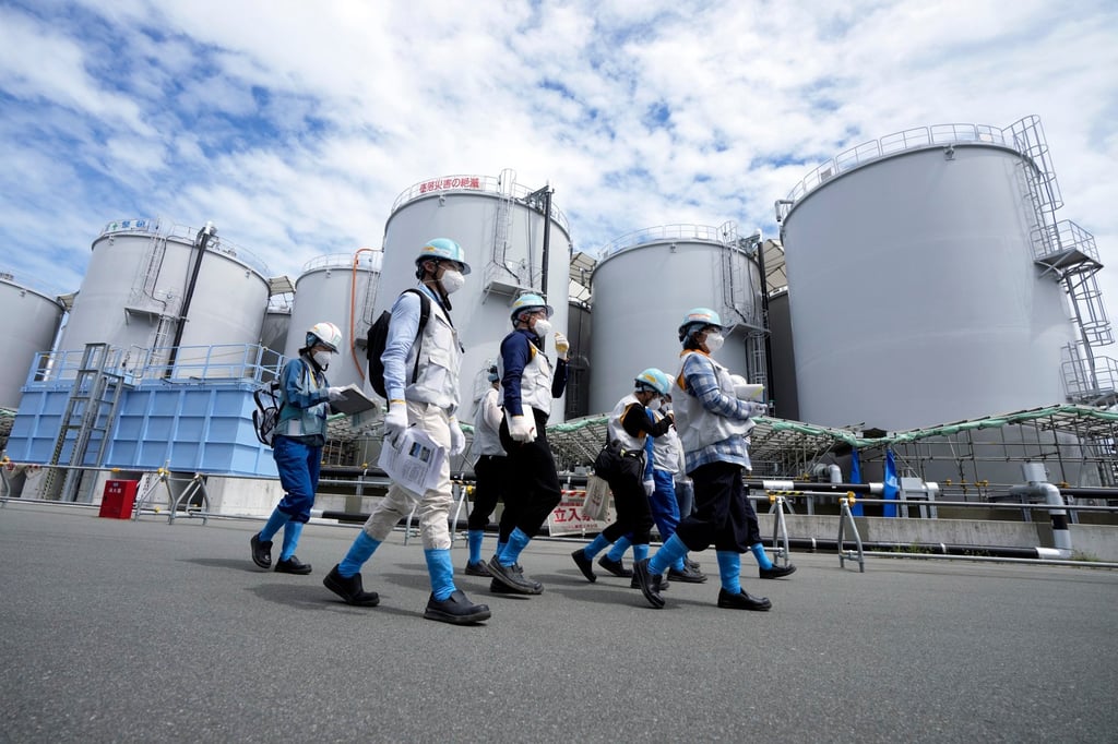 Foreign journalists on a guided tour of the Fukushima nuclear power plant last week amid the first release of treated waste water from the facility. Photo: EPA-EFE