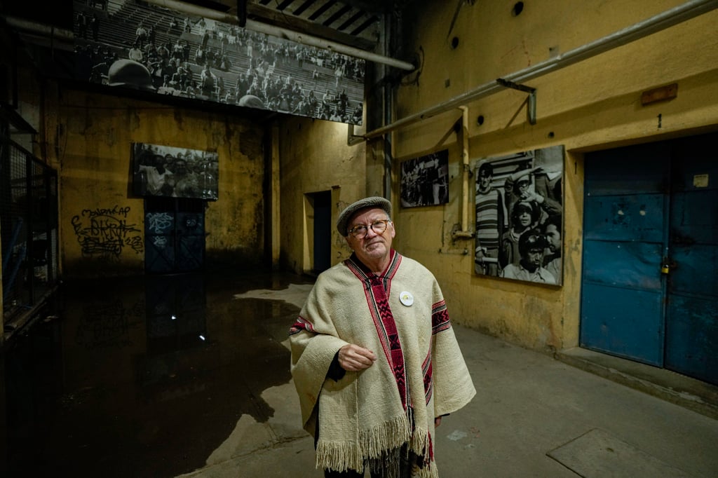 Former detainee Hector Hipolito Alvarez poses for a photo inside the dressing room of the National Stadium in Santiago, Chile, which was used as a prison and place of torture in 1973. Singer Victor Jara was also held prisoner there before his murder. Photo: AP Former detainee Hector Hipolito Alvarez poses for a photo inside the dressing room of the National Stadium in Santiago, Chile, which was used as a prison and place of torture in 1973. Singer Victor Jara was also held prisoner there before his murder. Photo: AP
