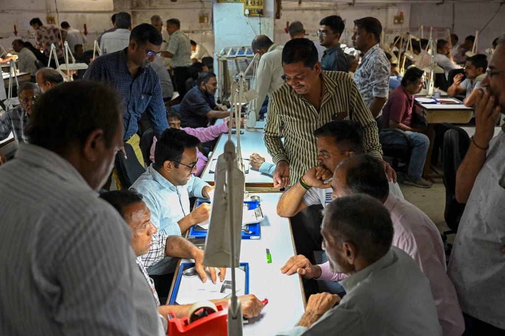 Traders gather at the diamond trading market in Surat, dubbed the “Diamond City of India”. Photo: AFP