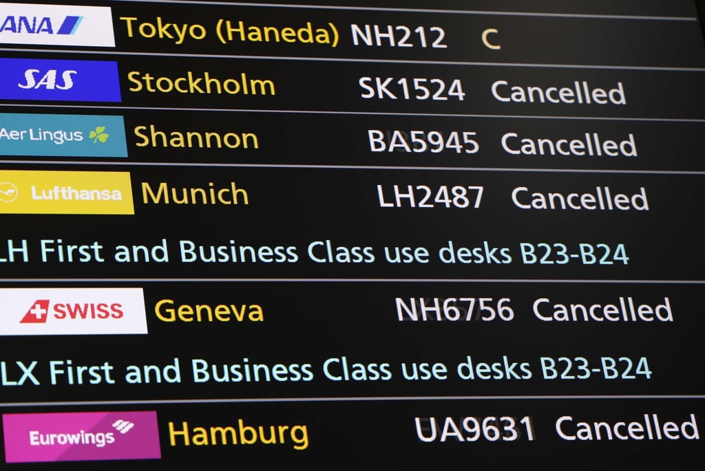 Cancelled flights are displayed on a departures board at Heathrow Airport in London after a technical failure caused delays. Photo: EPA-EFE