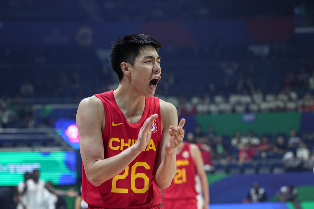 Zhu Junlong gestures during China’s win. Photo: Xinhua