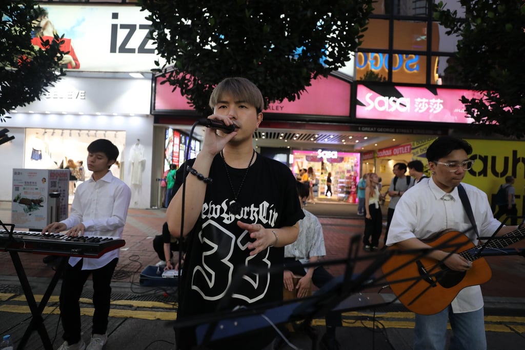Jay Lee (centre) is confident buskers can increase foot traffic in shopping areas, but says performers must have access to the right spaces. Photo: Xiaomei Chen Jay Lee (centre) is confident buskers can increase foot traffic in shopping areas, but says performers must have access to the right spaces. Photo: Xiaomei Chen