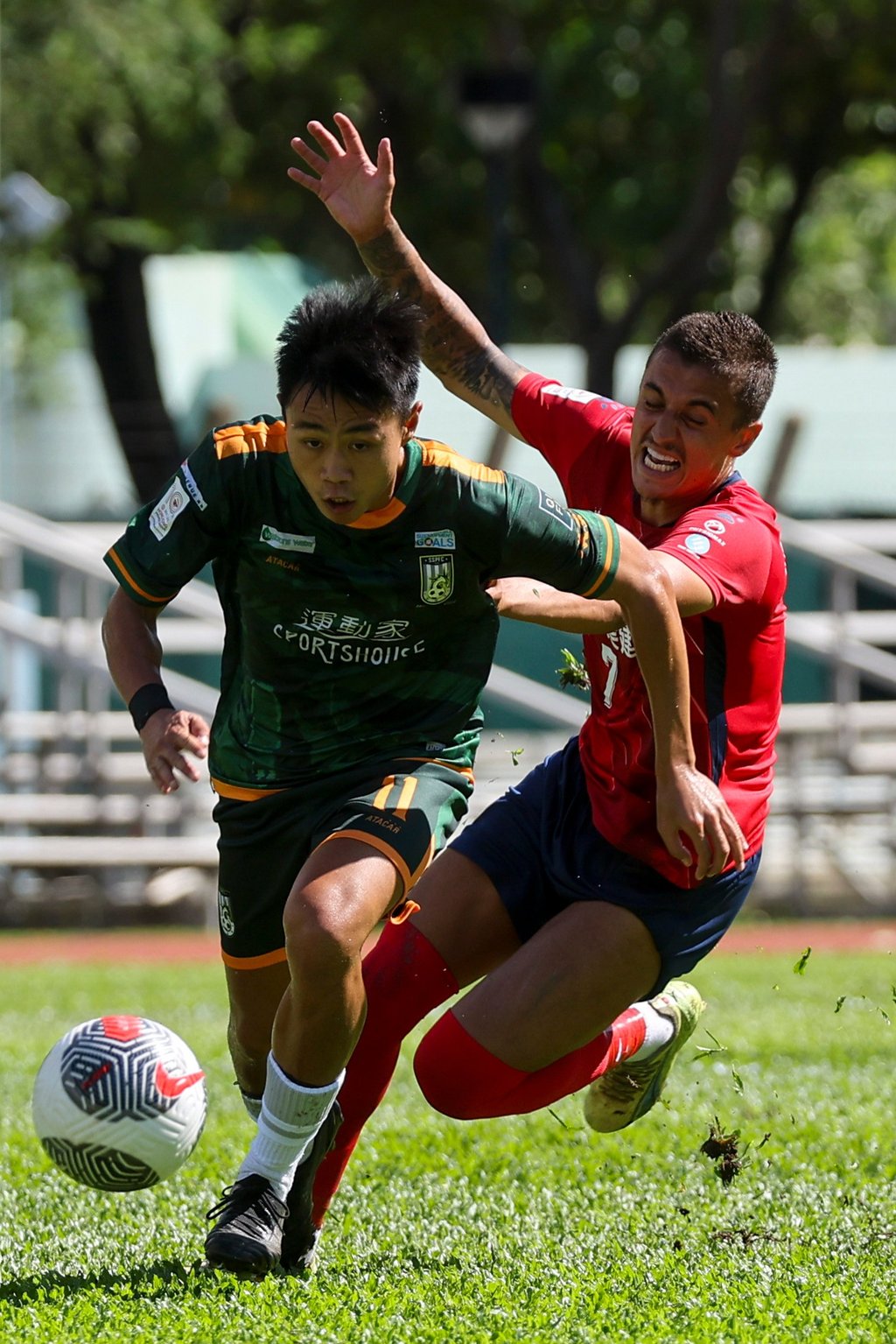 Sham Shui Po’s Timothy Wong Ching-yeung (left) beats Matheus Silva. Photo: Edmond So