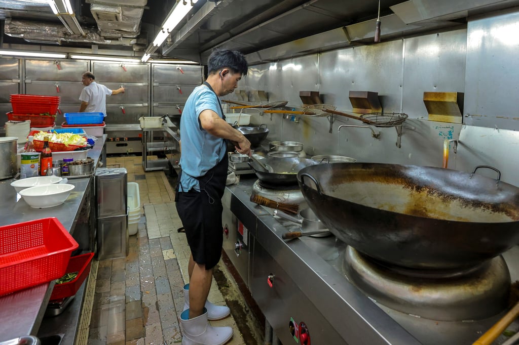 Lower-skilled kitchen staff can be recruited from outside Hong Kong as part of a government bid to ease a staffing crisis in a variety of sectors. Photo: Jelly Tse Lower-skilled kitchen staff can be recruited from outside Hong Kong as part of a government bid to ease a staffing crisis in a variety of sectors. Photo: Jelly Tse