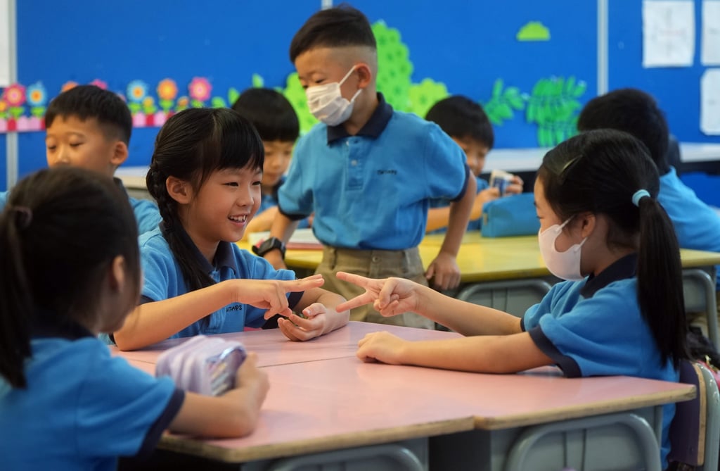 Students on the first day of school at Tsuen Wan Trade Association Primary School in Tsing Yi. Photo: Sam Tsang