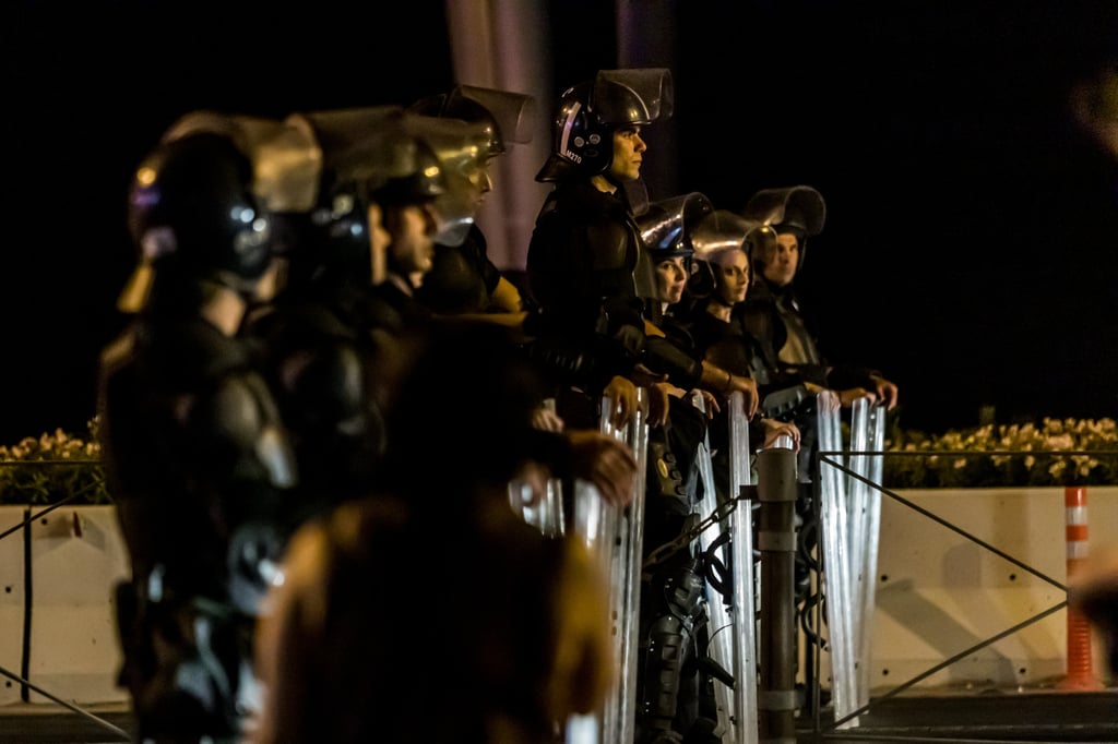 Police stand in line at a protest in Limassol, Cyprus on Saturday. Photo: Zuma Press Wire / dpa Police stand in line at a protest in Limassol, Cyprus on Saturday. Photo: Zuma Press Wire / dpa