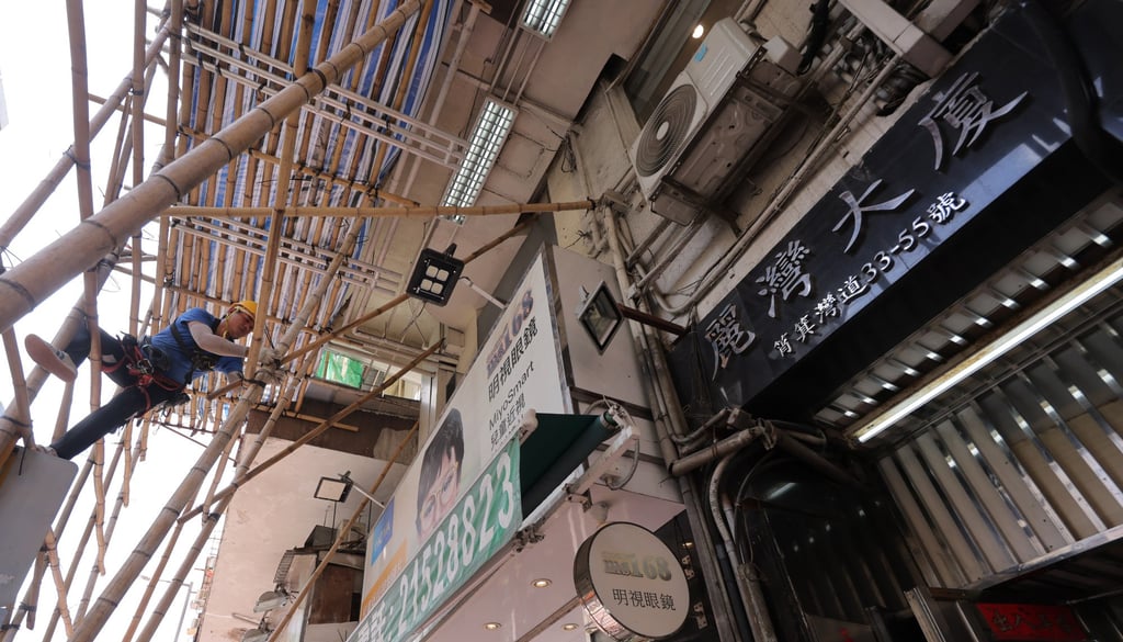 A 27-year-old man was injured in July when pieces of concrete fell from a building in Sai Wan Ho as he passed by. Photo: Jelly Tse A 27-year-old man was injured in July when pieces of concrete fell from a building in Sai Wan Ho as he passed by. Photo: Jelly Tse