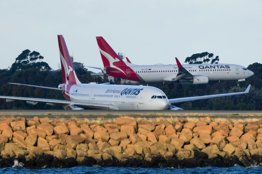 Qantas passenger jets at Sydney Airport. The airline is facing mounting scandals ranging from delays to the alleged sale of thousands of tickets for cancelled flights. Photo: AP Qantas passenger jets at Sydney Airport. The airline is facing mounting scandals ranging from delays to the alleged sale of thousands of tickets for cancelled flights. Photo: AP