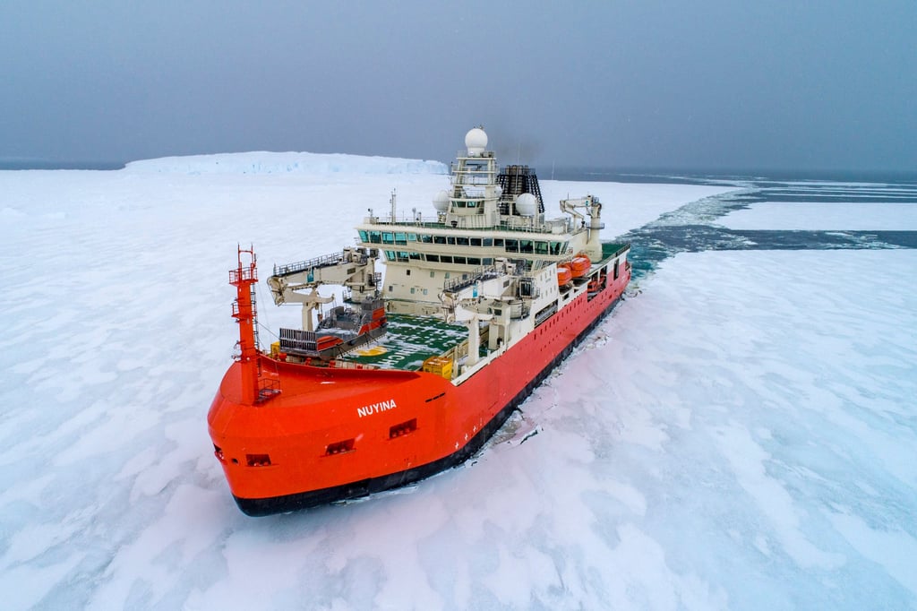 Australian icebreaker RSV Nuyina sails through the Antarctic. The ship broke through sea ice to reach a location 144km from the Casey research base before deploying helicopters to collect the patient. Photo: Australian Antarctic Division via AP Australian icebreaker RSV Nuyina sails through the Antarctic. The ship broke through sea ice to reach a location 144km from the Casey research base before deploying helicopters to collect the patient. Photo: Australian Antarctic Division via AP