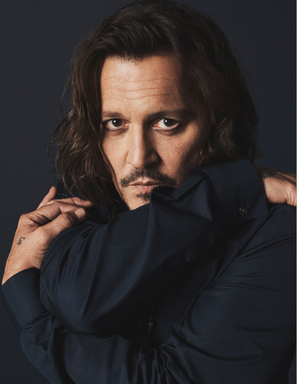 Style Edit Johnny Depp on music memory Al Pacino and loyalty the face of Dior Sauvage talks seductive scents escaping press on his Caribbean private island and directing the new Modigliani