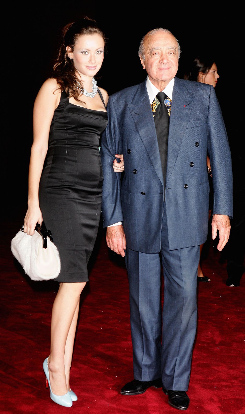 Mohamed Al-Fayed and his daughter Camilla arrive at a party for Dolce & Gabbana celebrating their 20th year in business in 2005, in Milan, Italy. Photo: Getty Images