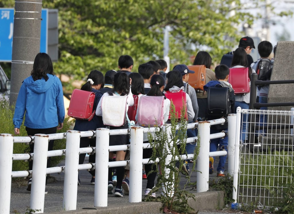 Schoolchildren in Niigata, central Japan. Photo: Kyodo Schoolchildren in Niigata, central Japan. Photo: Kyodo