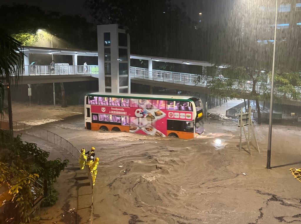 A bus is trapped by flooding in Shau Kei Wan. Photo: Martin Chan