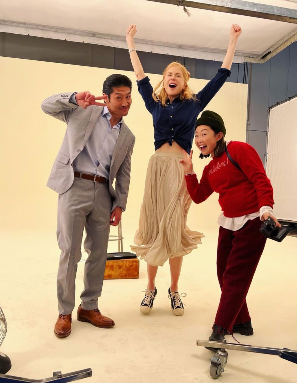 Nicole Kidman jumps for joy behind the scenes with co-star Brian Tee and director Lulu Wang. Photo: @thumbelulu/Instagram Nicole Kidman jumps for joy behind the scenes with co-star Brian Tee and director Lulu Wang. Photo: @thumbelulu/Instagram