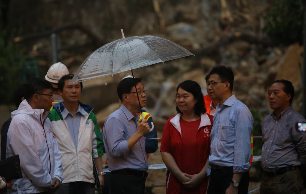 Hong Kong Chief Executive John Lee in Shau Kei Wan, where heavy rain caused a landslide. Photo: Xiaomei Chen Hong Kong Chief Executive John Lee in Shau Kei Wan, where heavy rain caused a landslide. Photo: Xiaomei Chen