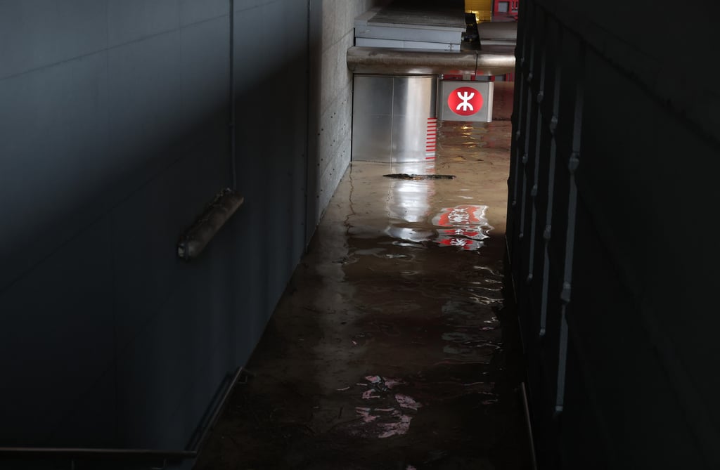 Rainwater flows into Temple Mall under black rainatorm warning in Wong Tai Sin on 8 September 2023. Photo: Edmond So