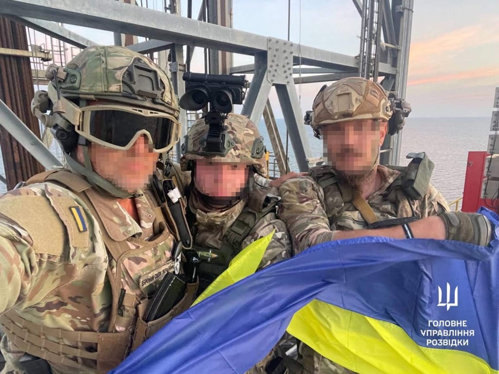 Ukrainian military members said to be on an oil and gas drilling platform in the Black Sea. Photo: Telegram / @DIUkraine via AFP Ukrainian military members said to be on an oil and gas drilling platform in the Black Sea. Photo: Telegram / @DIUkraine via AFP