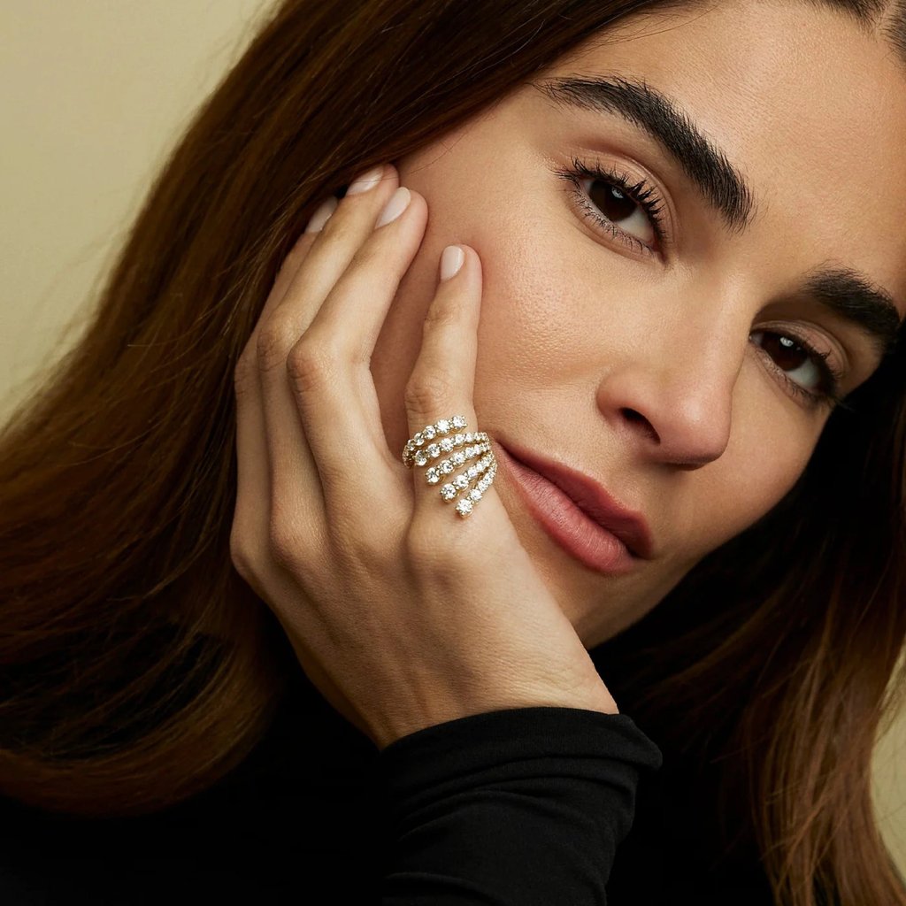 Melissa Kaye’s 18 karat yellow gold and diamond Dylan pinky ring.