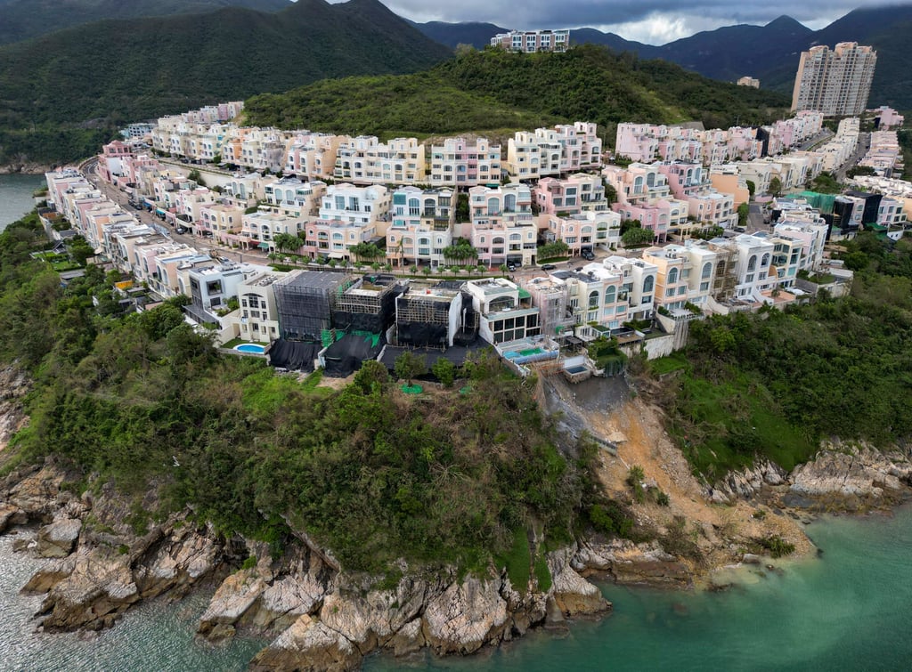 The properties at No 70, 72 and 74 at Redhill Peninsula were damaged by the landslide triggered by the record-breaking downpour last week. Photo: Sam Tsang The properties at No 70, 72 and 74 at Redhill Peninsula were damaged by the landslide triggered by the record-breaking downpour last week. Photo: Sam Tsang