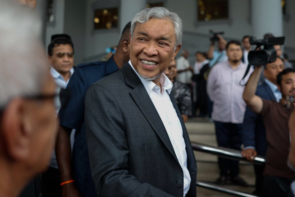 Malaysian Deputy Prime Minister Ahmad Zahid leaves the High Court after the court dismissed 47 corruption charges against him. Photo: dpa Malaysian Deputy Prime Minister Ahmad Zahid leaves the High Court after the court dismissed 47 corruption charges against him. Photo: dpa