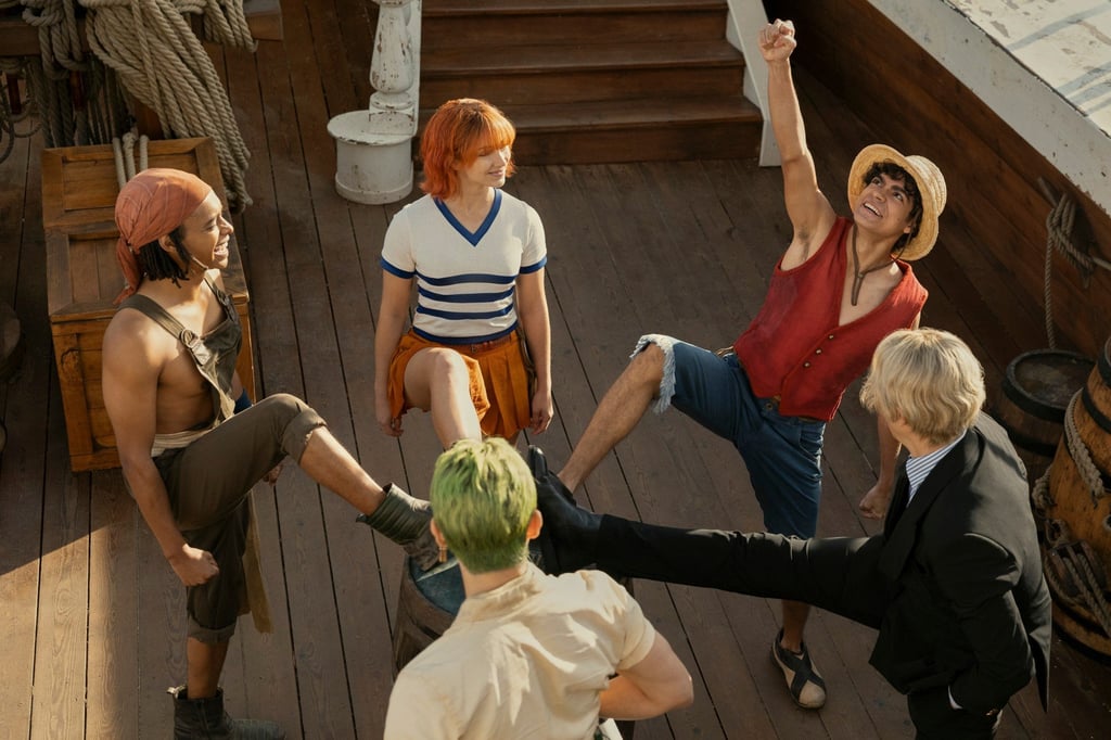 Jacob Romero Gibson as Usopp, Mackenyu Arata as Roronoa Zoro, Emily Rudd as Nami, Iñaki Godoy as Monkey D. Luffy, and Taz Skylar as Sanji in One Piece. Photo: Netflix Jacob Romero Gibson as Usopp, Mackenyu Arata as Roronoa Zoro, Emily Rudd as Nami, Iñaki Godoy as Monkey D. Luffy, and Taz Skylar as Sanji in One Piece. Photo: Netflix