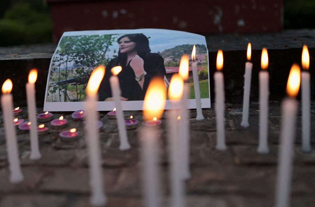 A photo of Mahsa Amini at a condolence meeting in New Delhi. Photo: Reuters