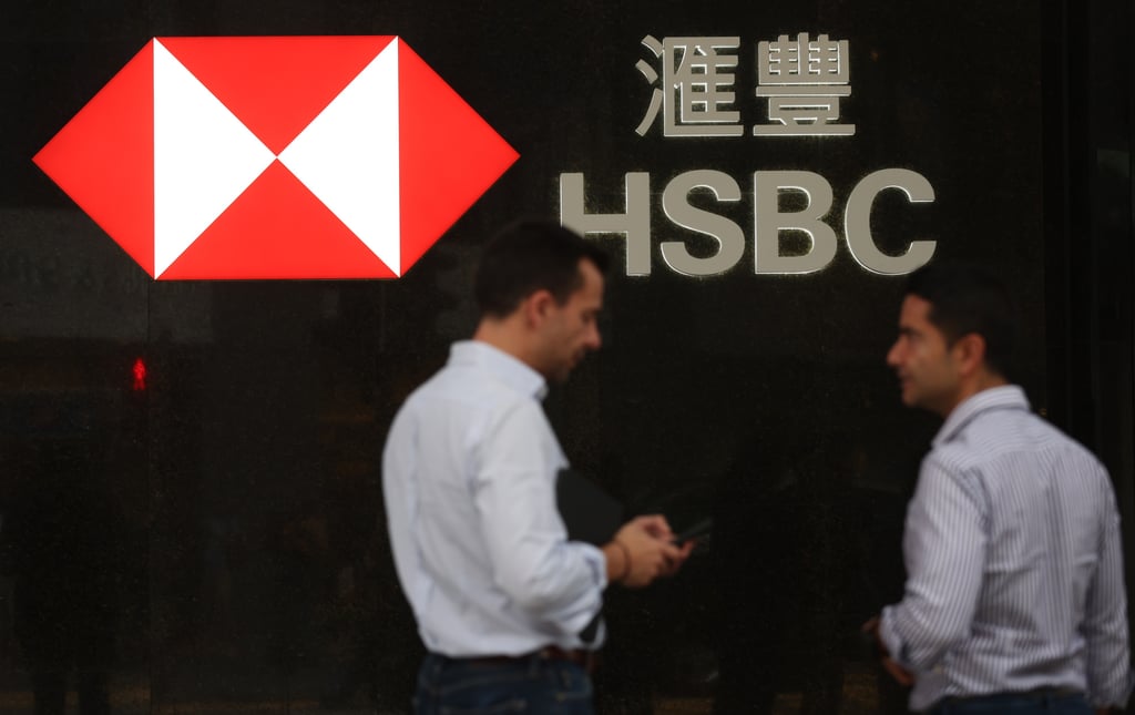 Pedestrians walk past a HSBC branch at Pedder Street, Central. Photo Yik Yeung-man