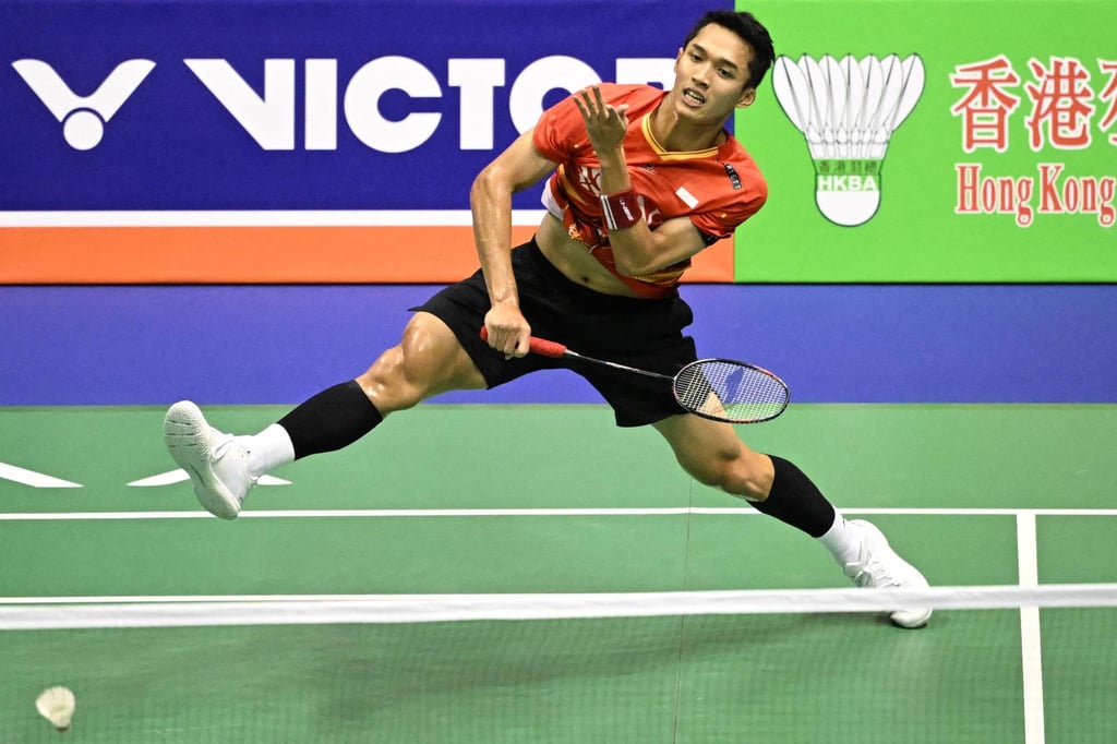 Jonatan Christie of Indonesia hits a return against Kenta Nishimoto of Japan in the men’s singles final. Photo: AFP Jonatan Christie of Indonesia hits a return against Kenta Nishimoto of Japan in the men’s singles final. Photo: AFP