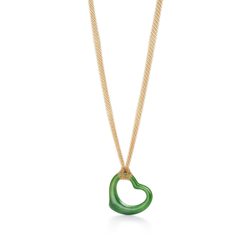Tiffany & Co. Elsa Peretti Open Heart pendant in green jade, with a 18k gold mesh chain. Photos: Handout