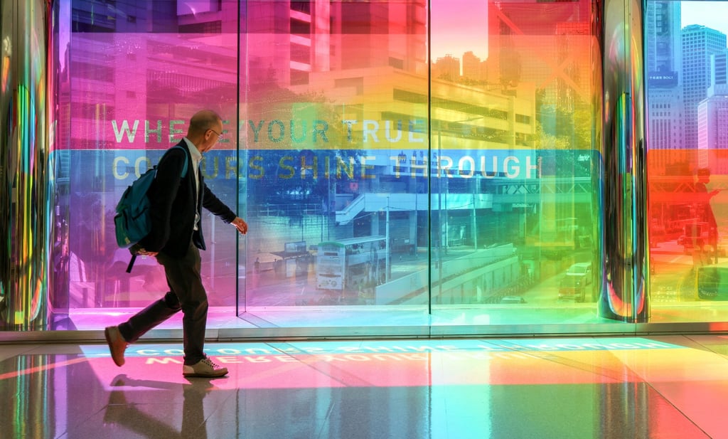 Sunlight passing through an advertising display casts colours across a pedestrian walkway in Admiralty, Hong Kong, on September 18, 2023. Photo: Jelly Tse Sunlight passing through an advertising display casts colours across a pedestrian walkway in Admiralty, Hong Kong, on September 18, 2023. Photo: Jelly Tse