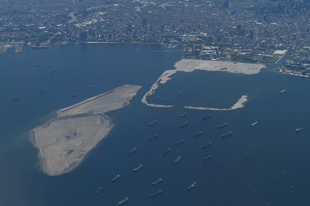 An aerial shot shows a land reclamation site in Manila Bay last month. The two women had been working with coastal communities opposed to reclamation activities when they disappeared. Photo: AFP An aerial shot shows a land reclamation site in Manila Bay last month. The two women had been working with coastal communities opposed to reclamation activities when they disappeared. Photo: AFP