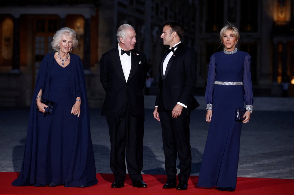 French President Emmanuel Macron, his wife Brigitte Macron, Britain’s King Charles and Queen Camilla arrive for a state dinner at Versailles Palace on Wednesday. Photo: Reuters French President Emmanuel Macron, his wife Brigitte Macron, Britain’s King Charles and Queen Camilla arrive for a state dinner at Versailles Palace on Wednesday. Photo: Reuters