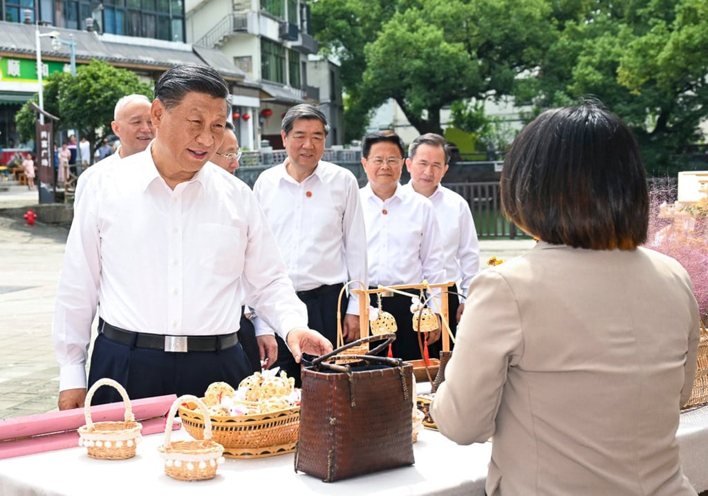 Xi Jinping visits the village of Lizu, in Zhejiang province. Photo: Xinhua