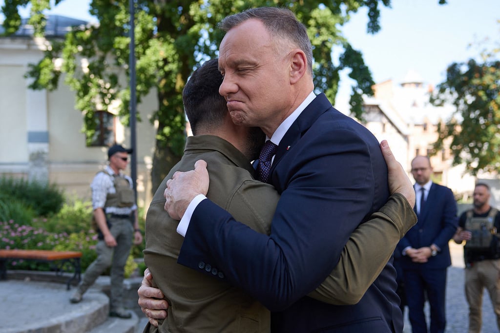 Ukraine’s President Volodymyr Zelensky embracing Poland’s President Andrzej Duda (right) in July. File photo: Ukrainian Presidential Press Service Ukraine’s President Volodymyr Zelensky embracing Poland’s President Andrzej Duda (right) in July. File photo: Ukrainian Presidential Press Service