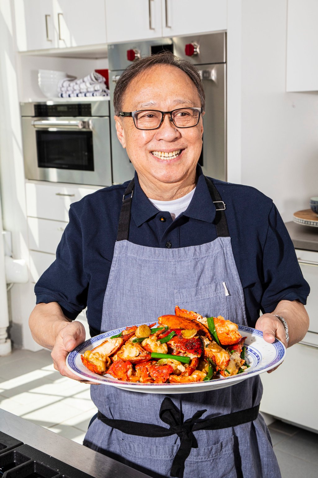 Jeffrey Pang with a ginger and scallion stir-fried lobster dish. Photo: A Very Chinese Cookbook Jeffrey Pang with a ginger and scallion stir-fried lobster dish. Photo: A Very Chinese Cookbook