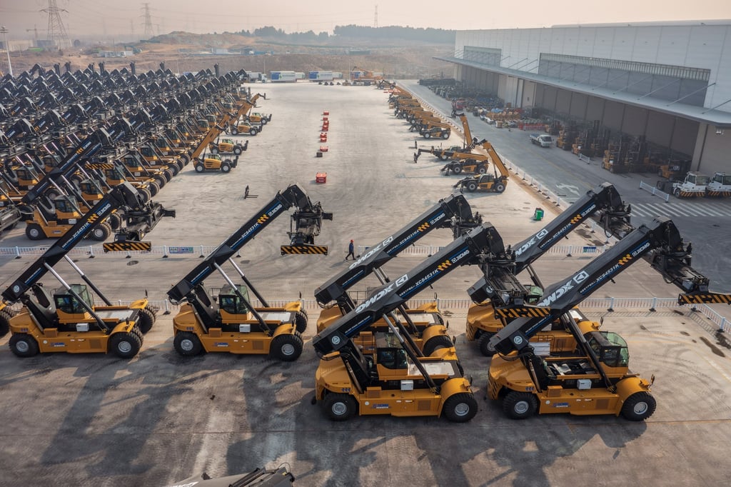 New cranes sit outside the Xuzhou XCMG Port Machinery factory in Xuzhou, China on February 24, 2023. Photo: EPA-EFE
