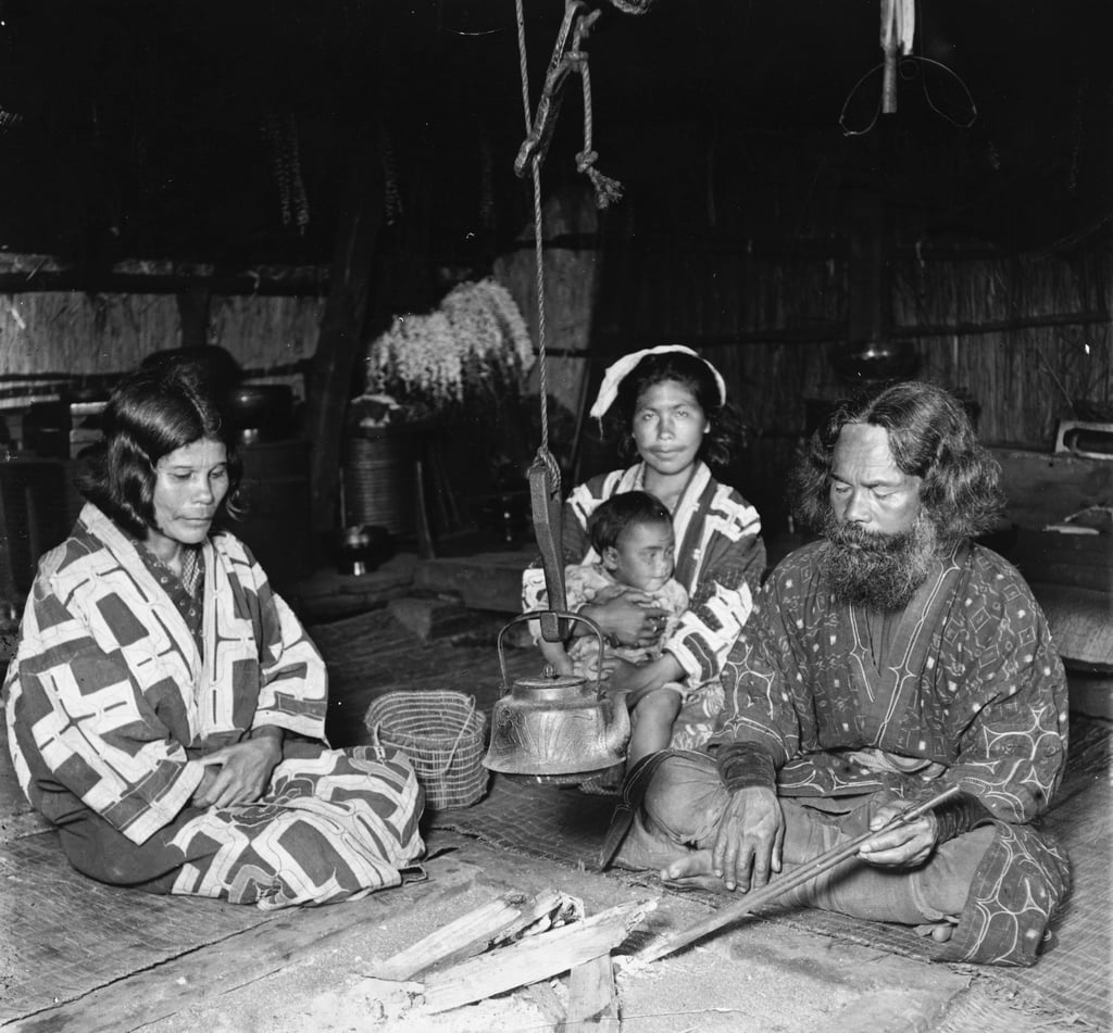 A family inside an Ainu home. Photo: Getty Images A family inside an Ainu home. Photo: Getty Images
